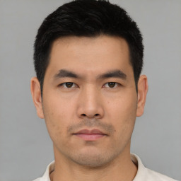 Neutral asian young-adult male with short  black hair and brown eyes