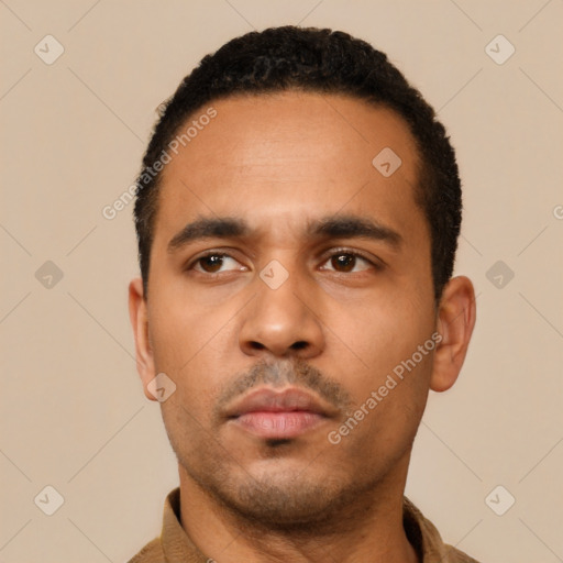 Neutral latino young-adult male with short  black hair and brown eyes