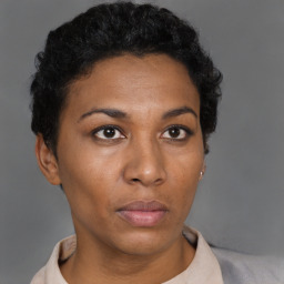 Neutral black young-adult female with short  black hair and brown eyes