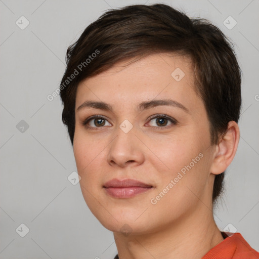 Joyful white young-adult female with short  brown hair and brown eyes