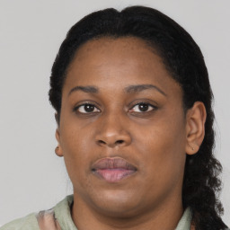 Neutral black young-adult female with short  black hair and brown eyes