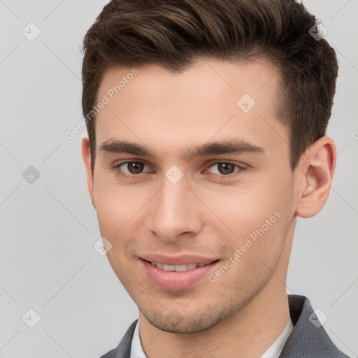 Joyful white young-adult male with short  brown hair and brown eyes