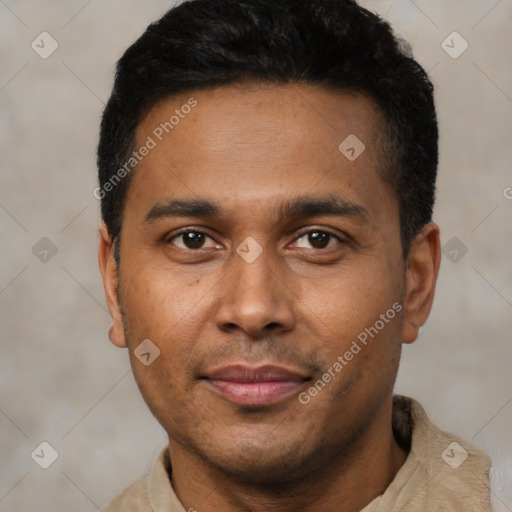 Joyful latino young-adult male with short  black hair and brown eyes