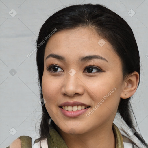 Joyful latino young-adult female with medium  brown hair and brown eyes