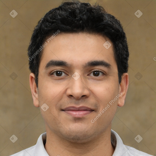 Joyful latino young-adult male with short  black hair and brown eyes