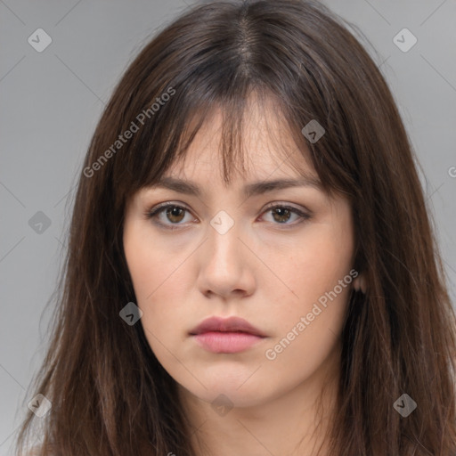 Neutral white young-adult female with long  brown hair and brown eyes