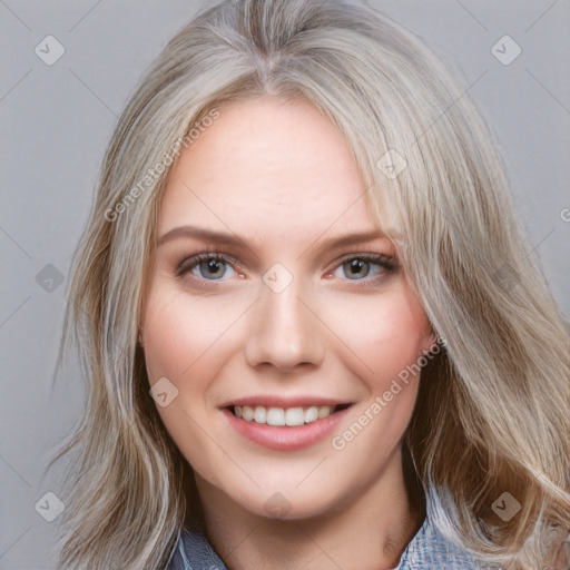 Joyful white young-adult female with medium  brown hair and blue eyes