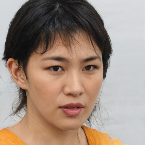Neutral asian young-adult female with medium  brown hair and brown eyes