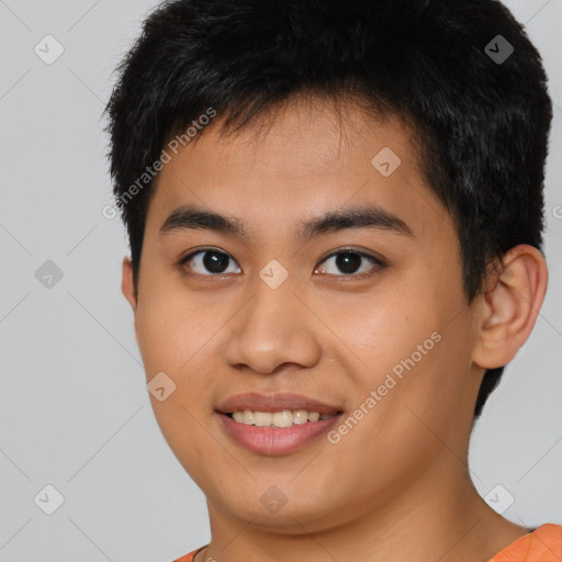 Joyful asian young-adult male with short  brown hair and brown eyes