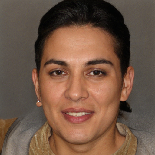 Joyful white adult female with short  brown hair and brown eyes