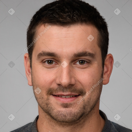 Joyful white young-adult male with short  brown hair and brown eyes