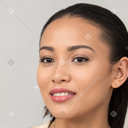 Joyful white young-adult female with long  black hair and brown eyes