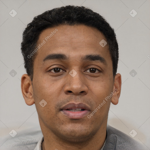Neutral latino young-adult male with short  black hair and brown eyes
