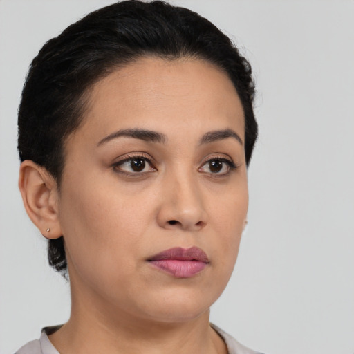 Neutral latino young-adult female with short  brown hair and brown eyes