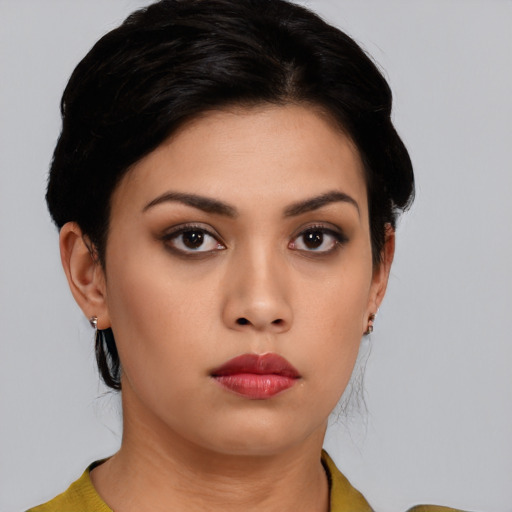 Neutral asian young-adult female with short  black hair and brown eyes