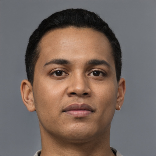 Neutral latino young-adult male with short  black hair and brown eyes