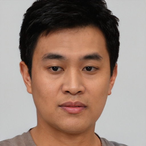 Neutral asian young-adult male with short  black hair and brown eyes