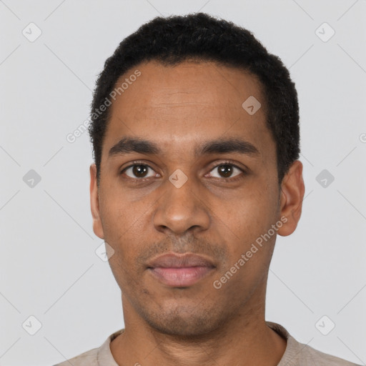 Neutral black young-adult male with short  black hair and brown eyes