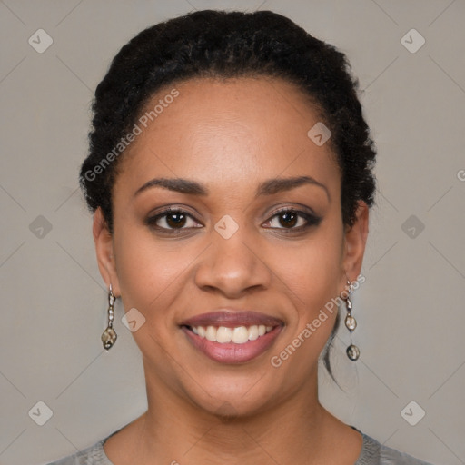 Joyful latino young-adult female with short  black hair and brown eyes