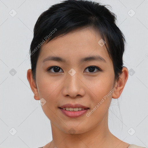 Joyful asian young-adult female with short  brown hair and brown eyes