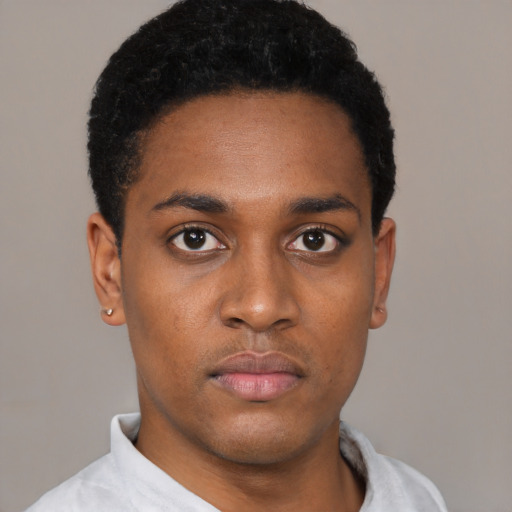 Neutral black young-adult male with short  black hair and brown eyes