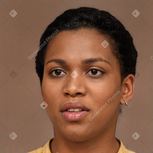 Joyful latino young-adult female with short  black hair and brown eyes