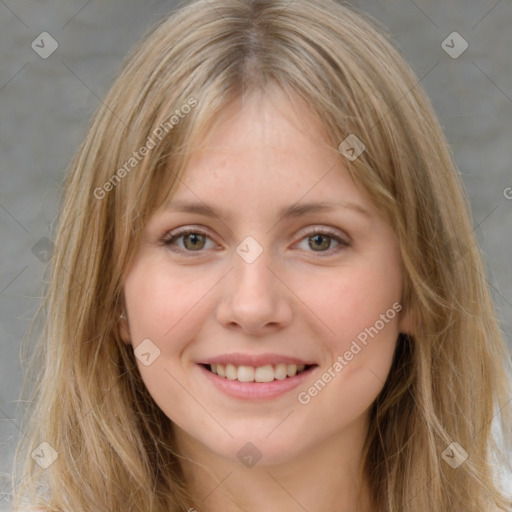 Joyful white young-adult female with medium  brown hair and blue eyes