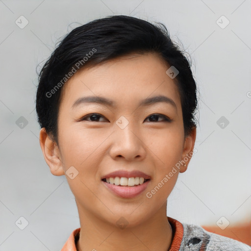 Joyful asian young-adult female with short  black hair and brown eyes