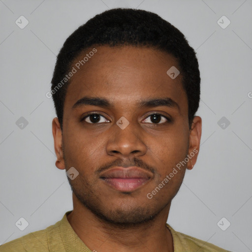 Joyful black young-adult male with short  brown hair and brown eyes