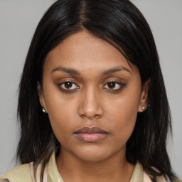 Neutral asian young-adult female with medium  brown hair and brown eyes