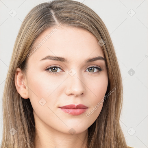 Neutral white young-adult female with long  brown hair and brown eyes