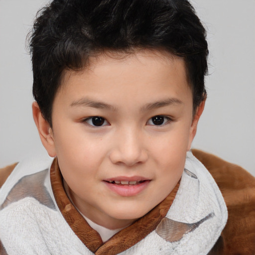 Joyful asian child female with short  brown hair and brown eyes