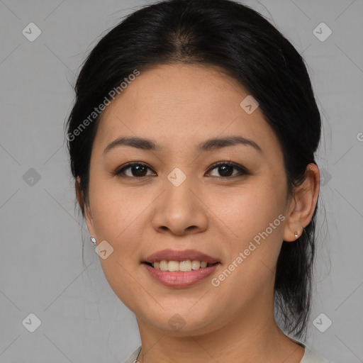 Joyful asian young-adult female with medium  brown hair and brown eyes