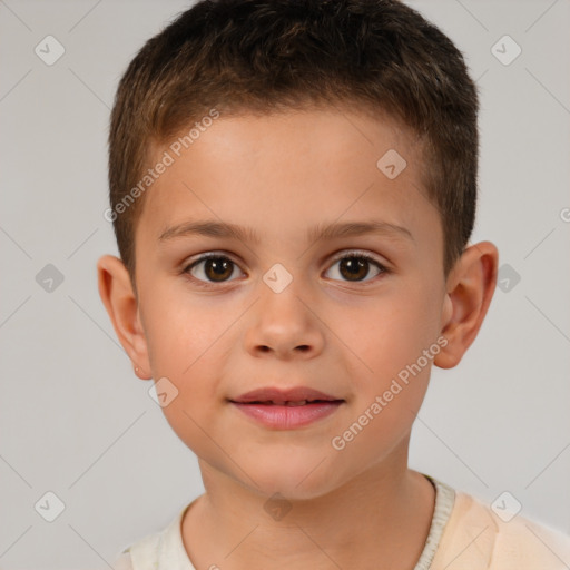 Joyful white child male with short  brown hair and brown eyes