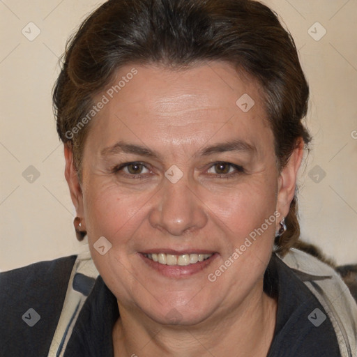 Joyful white adult female with short  brown hair and brown eyes