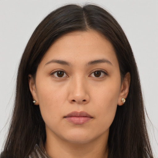 Neutral asian young-adult female with long  brown hair and brown eyes