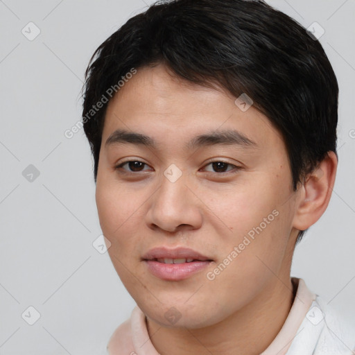 Joyful asian young-adult male with short  brown hair and brown eyes