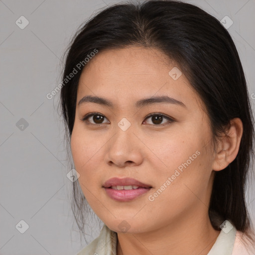 Joyful asian young-adult female with medium  brown hair and brown eyes