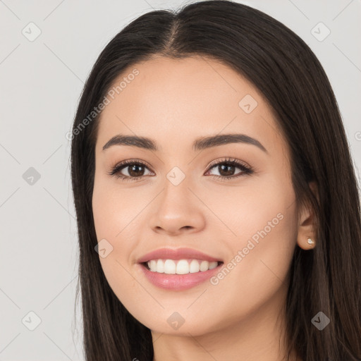 Joyful white young-adult female with long  black hair and brown eyes