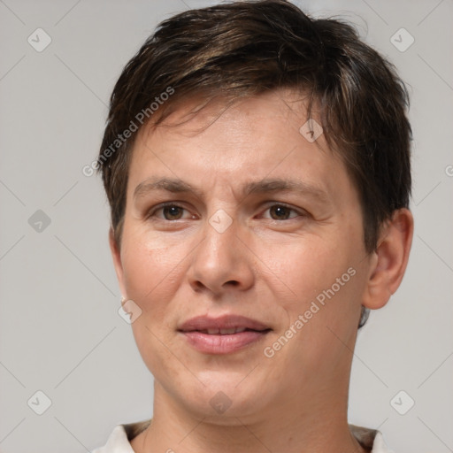 Joyful white adult female with short  brown hair and brown eyes