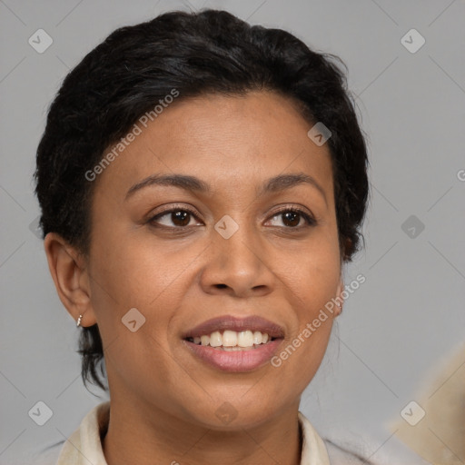 Joyful latino adult female with medium  brown hair and brown eyes