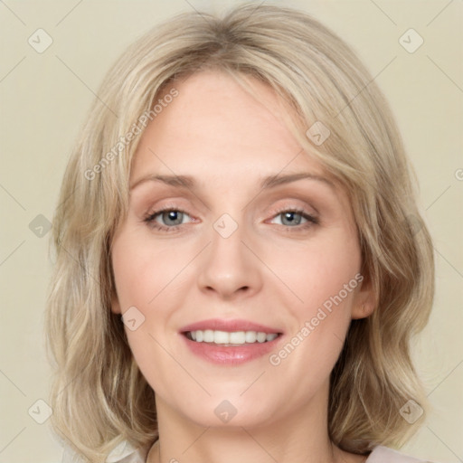 Joyful white young-adult female with medium  brown hair and green eyes