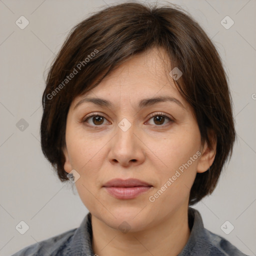 Joyful white adult female with medium  brown hair and brown eyes