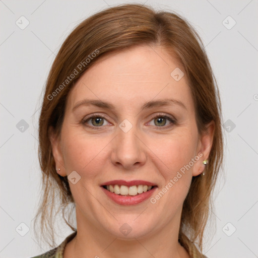 Joyful white young-adult female with medium  brown hair and green eyes