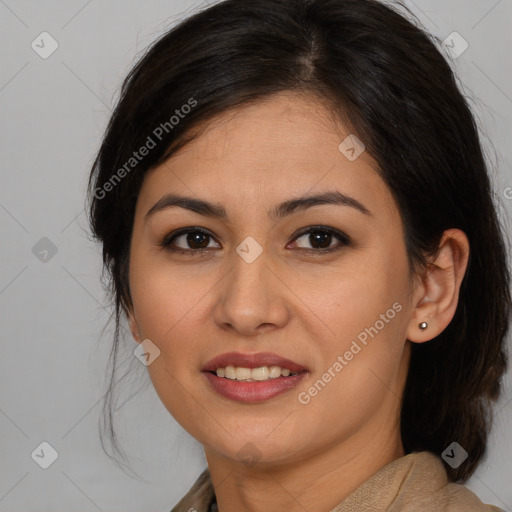 Joyful latino young-adult female with medium  brown hair and brown eyes