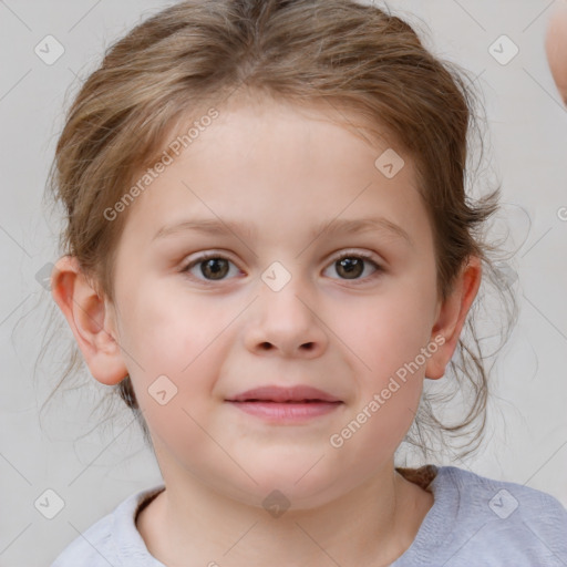 Joyful white child female with medium  brown hair and blue eyes