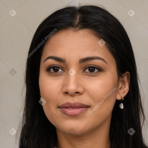 Joyful latino young-adult female with long  brown hair and brown eyes