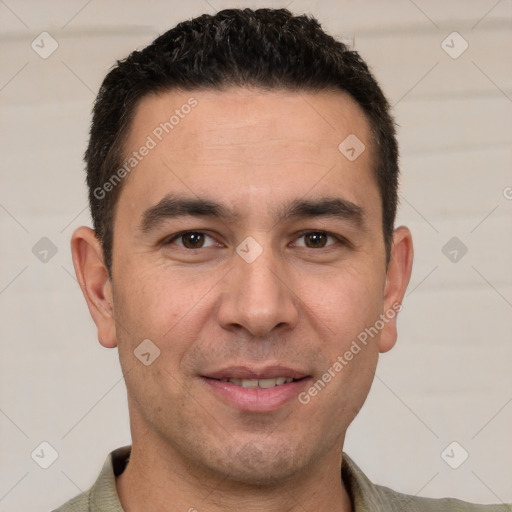 Joyful white young-adult male with short  brown hair and brown eyes