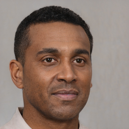 Neutral black young-adult male with short  brown hair and brown eyes