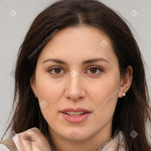 Joyful white young-adult female with long  brown hair and brown eyes